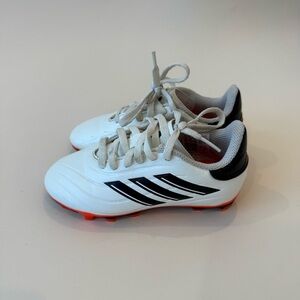 Adidas White and Black Copa Cleats with Orange Soles